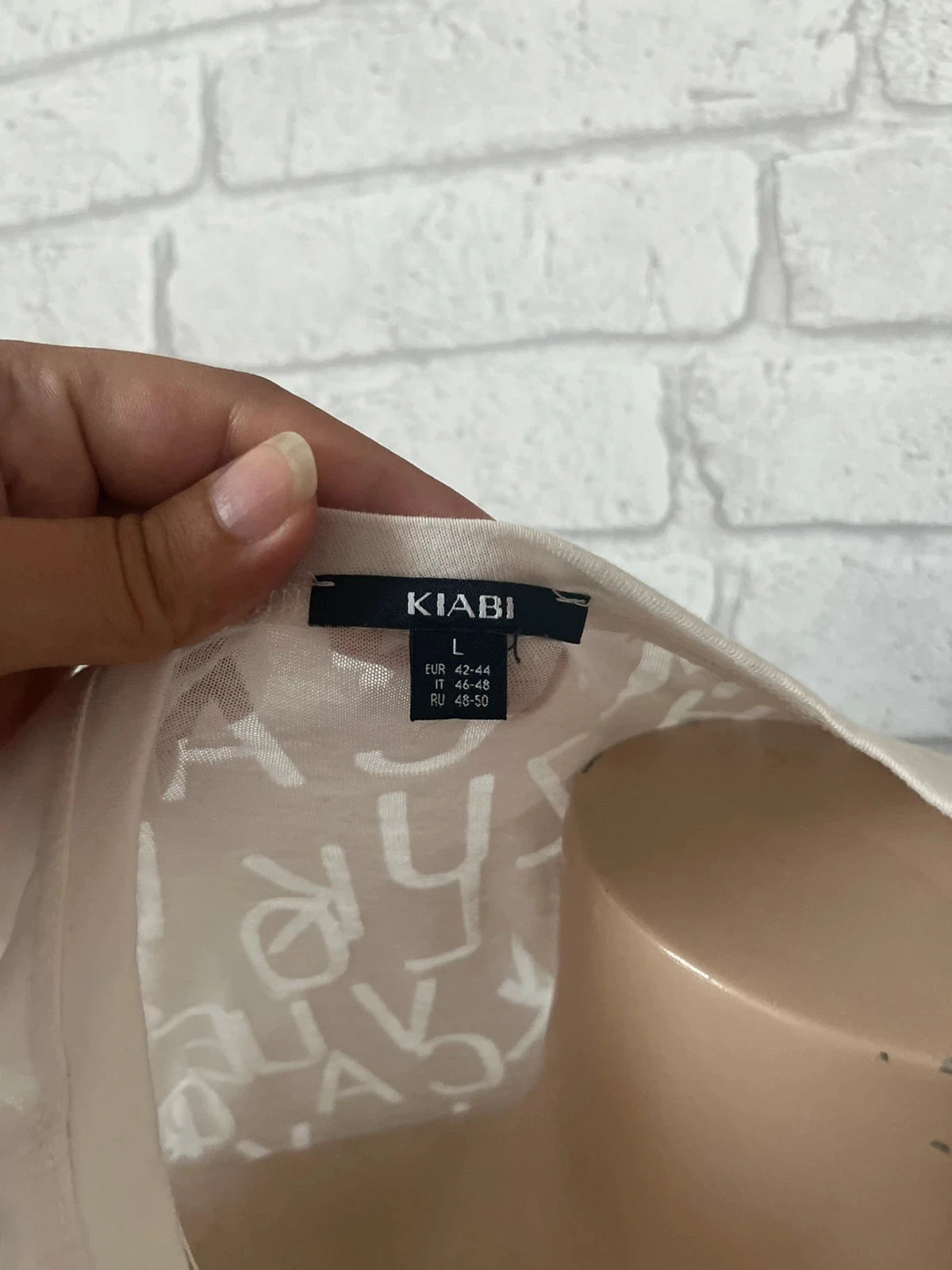 T-shirt branca com mensagem Feeling Positive – Tamanho 40 – KIABI – photo 2